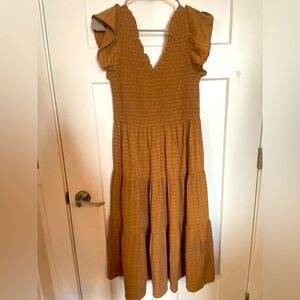 And now this, Macys brand dress, size medium, tan color, never worn.